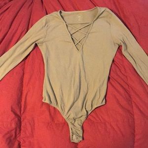 Tan cross laced deep v-neck body suit